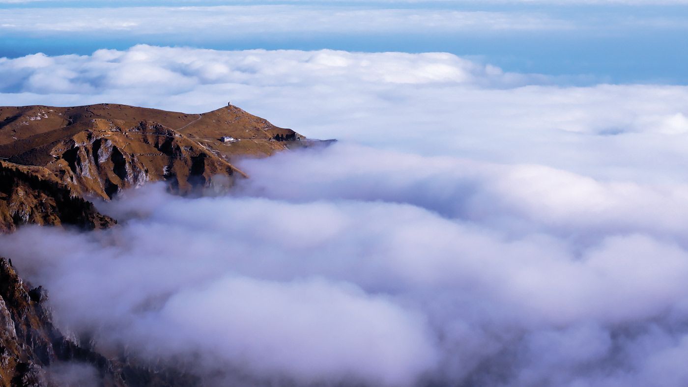 Aerial view of Monte Grappa surrounded by clouds